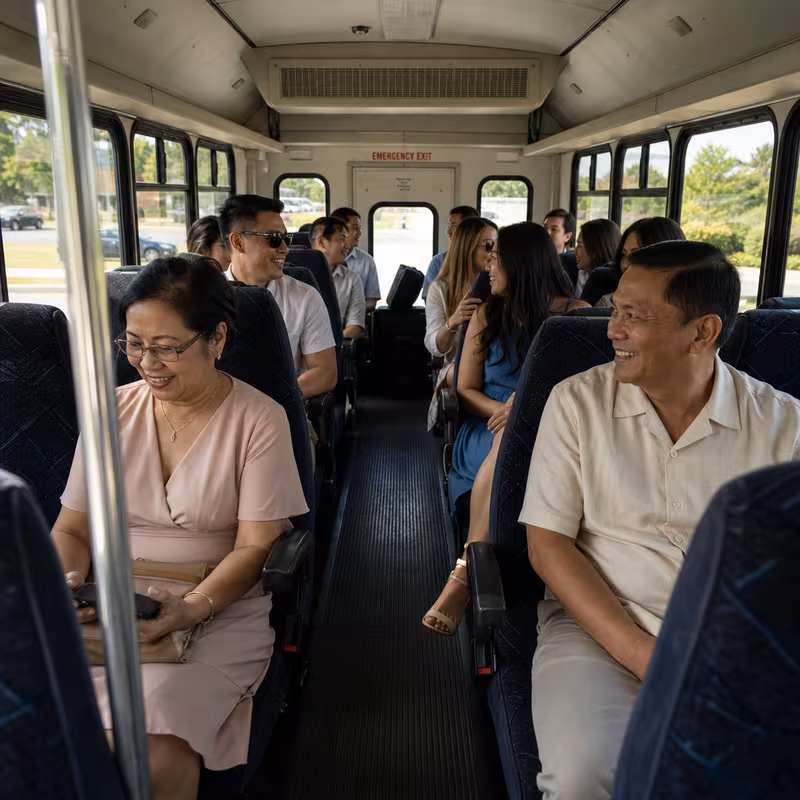Group boarding a white charter bus for Private Event Transportation transportation in Sacramento